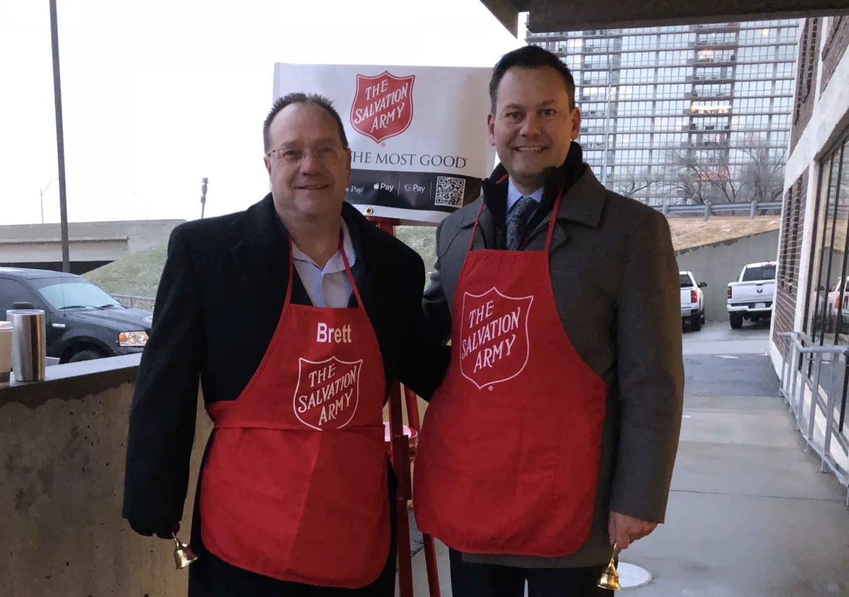 Brett Gordon and Ramin Cherafat ringing the bells for Salvation Army.