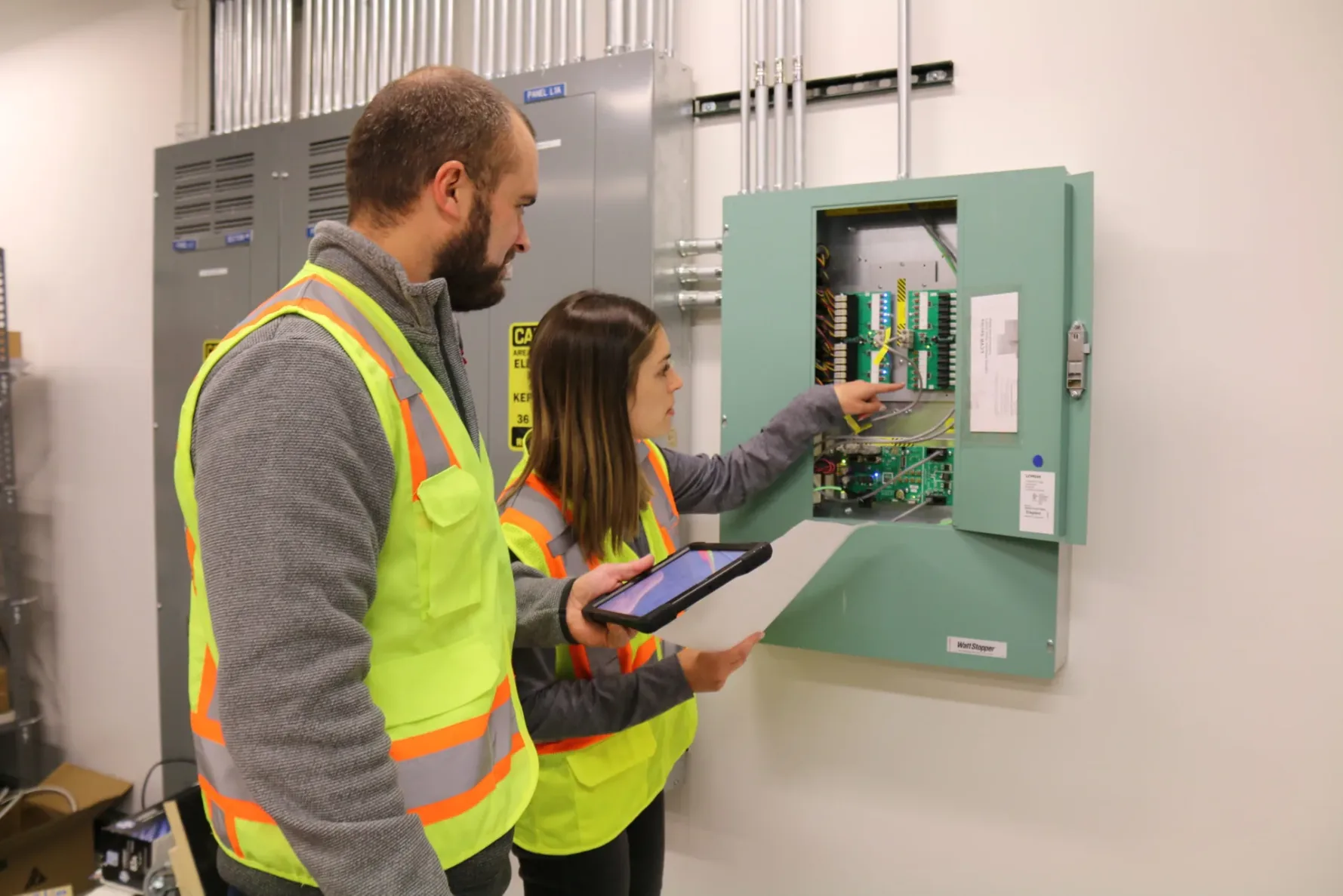 Two McCownGordon Construction workers discussing the building commissioning process