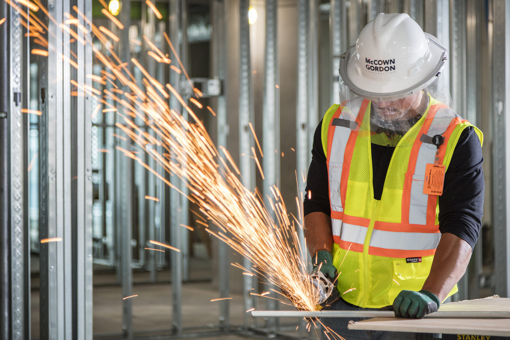 A McCownGordon Construction worker welding metal