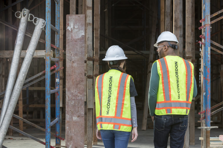 Two construction workers at a project site