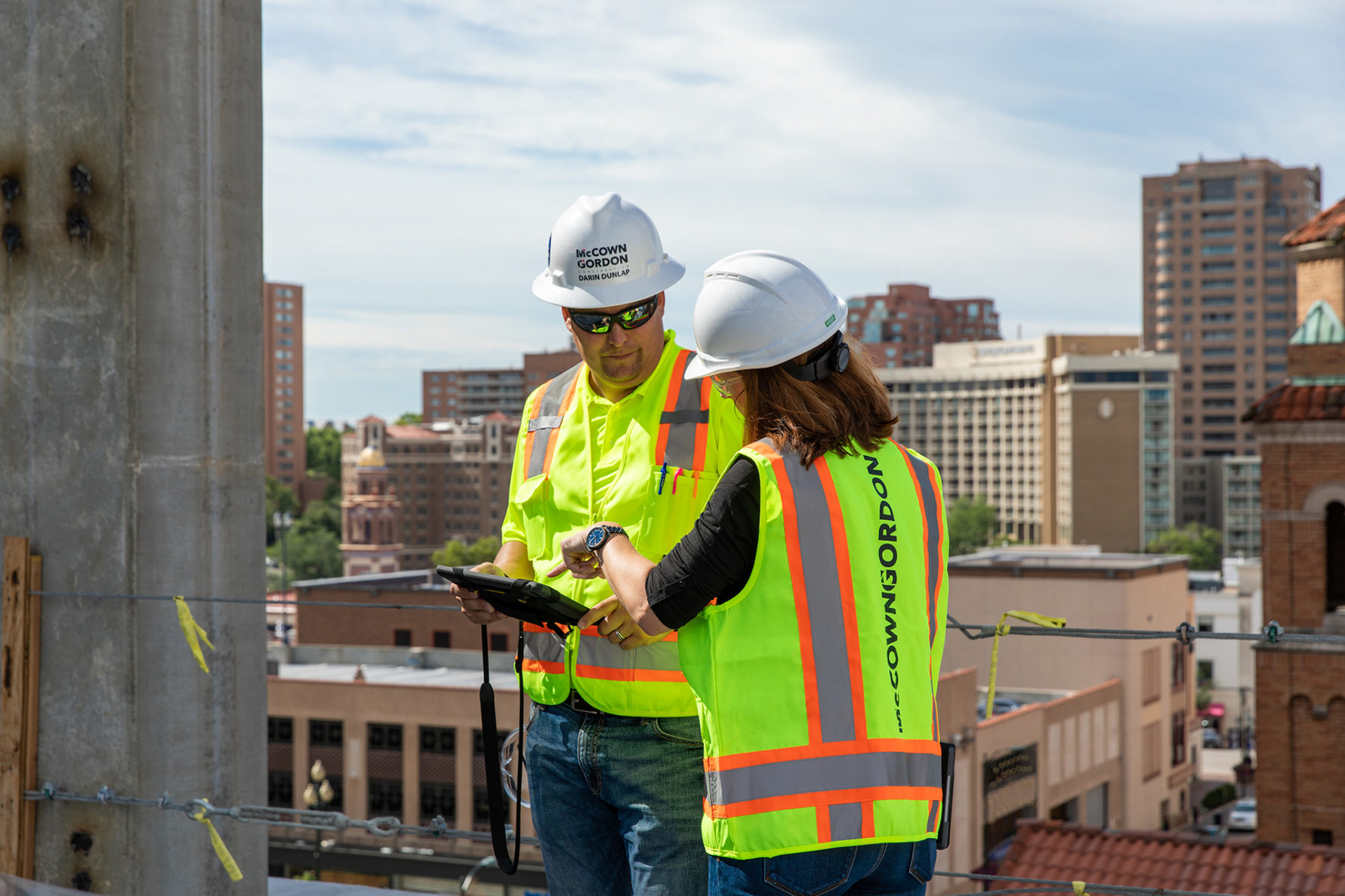 Two McCownGordon workers discussing project plans