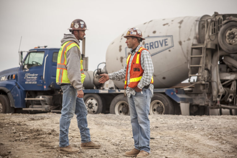 McCownGordon associates talking on a construction site