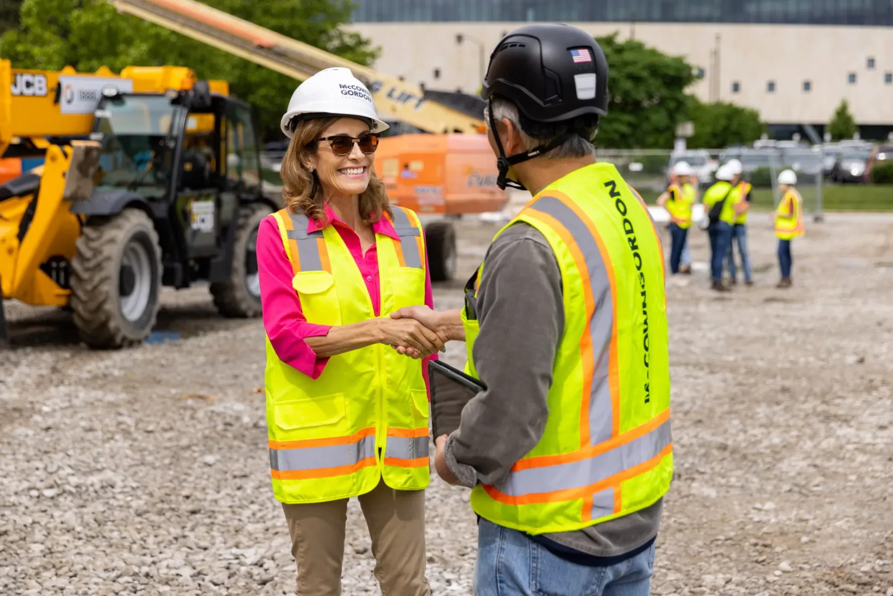 McCownGordon associate building relationship by shaking hands with owner on project site