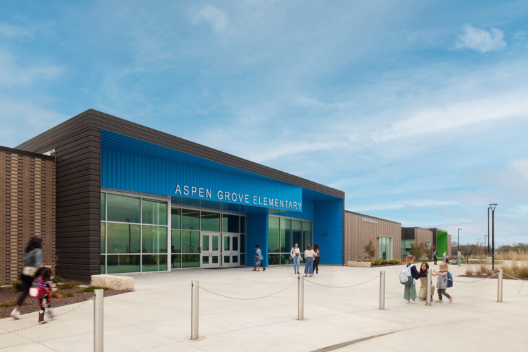 Students and teachers walking into Aspen Grove Elementary, a school built by McCownGordon Construction.