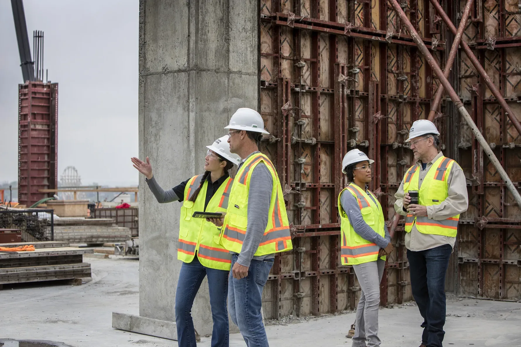 McCownGordon associates talk on a jobsite