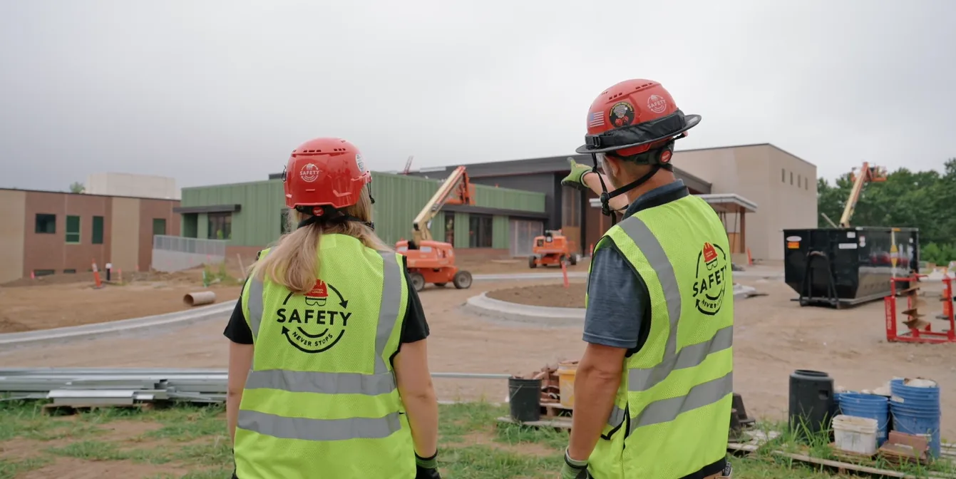 Two McCownGordon Construction associates talking on a jobsite in Kansas City