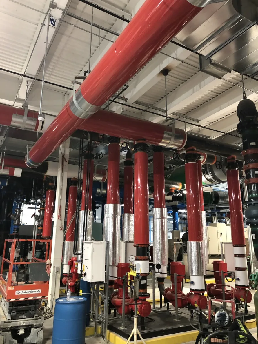 Red piping at the Walmart central utility plant in northwest arkansas