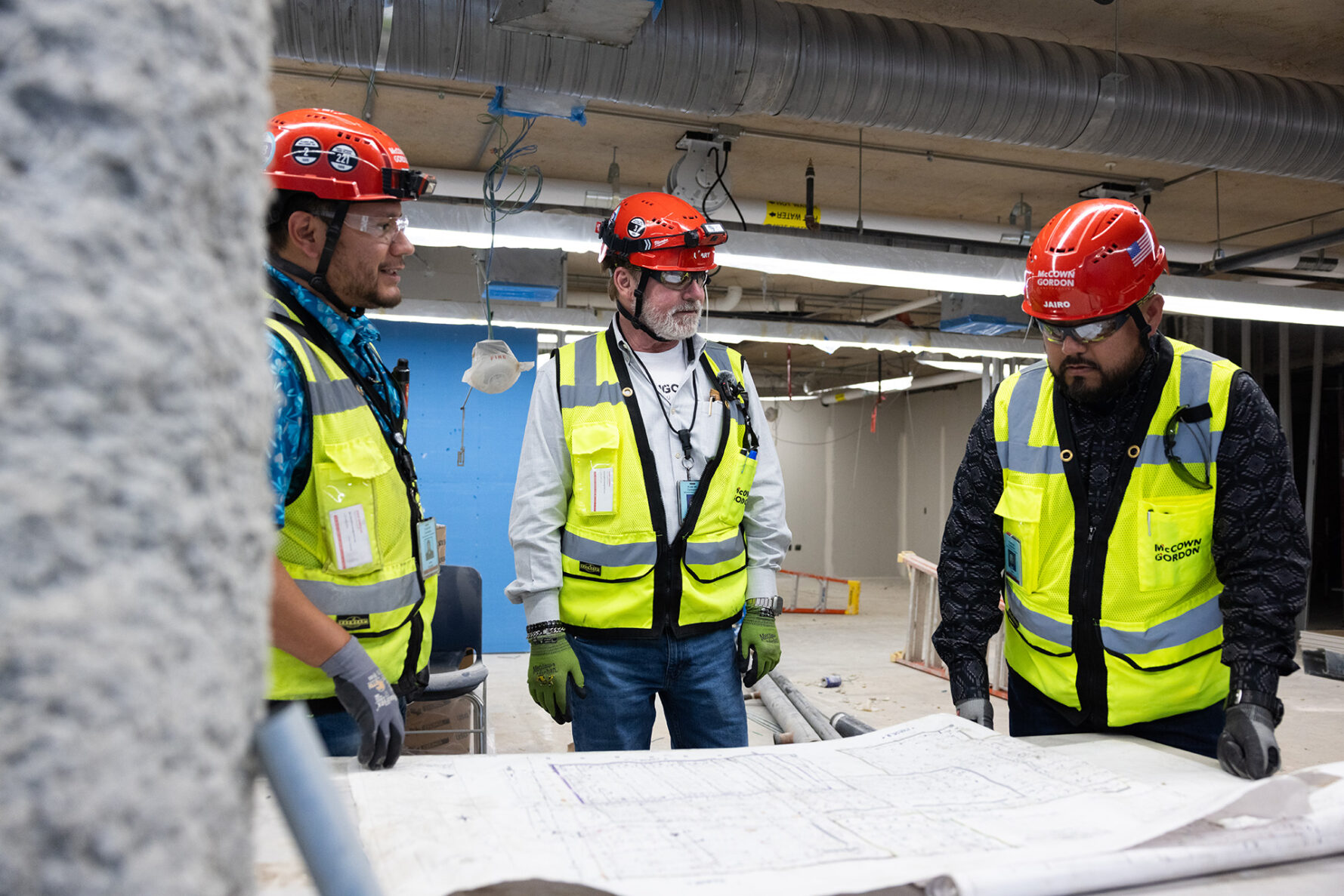 McCownGordon associates collaborating on jobsite.