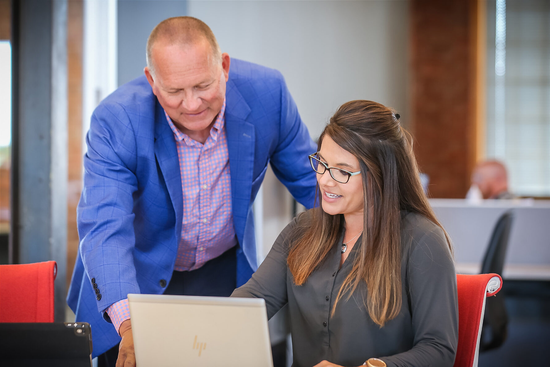 McCownGordon associates collaborating together in office.