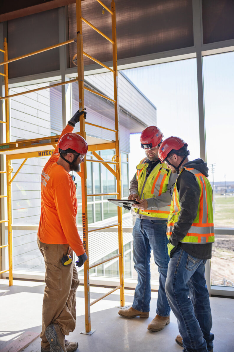 McCownGordon associates collaborating on jobsite.